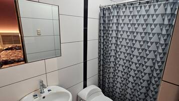 Shower, rainfall showerhead, towels