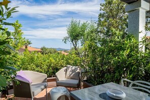 Superior Room, Sea View | Living area | Flat-screen TV - Geco di Giada Exclusive Art Suites (Olbia)