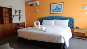 Junior Suite | Minibar, in-room safe, desk, iron/ironing board