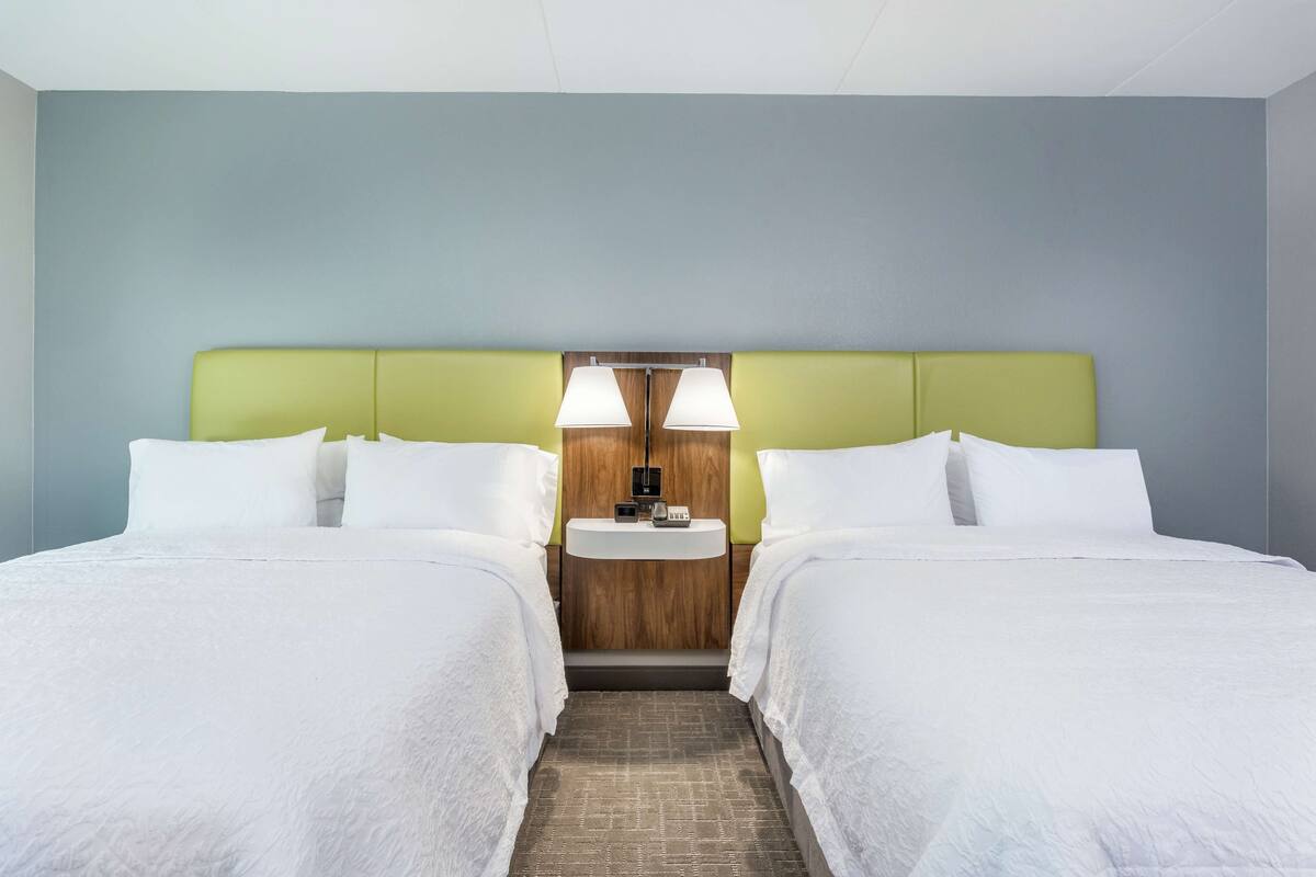 desk, laptop workspace, blackout curtains, iron/ironing board