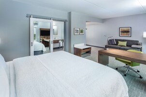 Desk, laptop workspace, blackout drapes, iron/ironing board