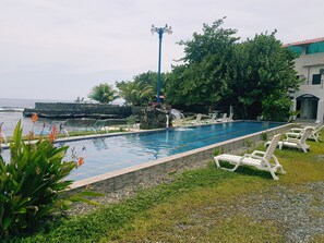 Outdoor pool, pool umbrellas, pool loungers