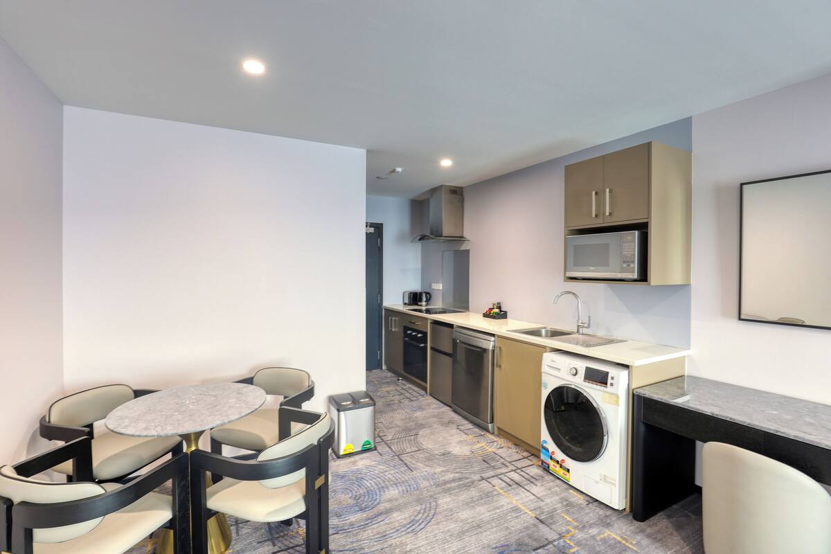 two bedrooms suite | private kitchen | mini-fridge, microwave, oven, stovetop