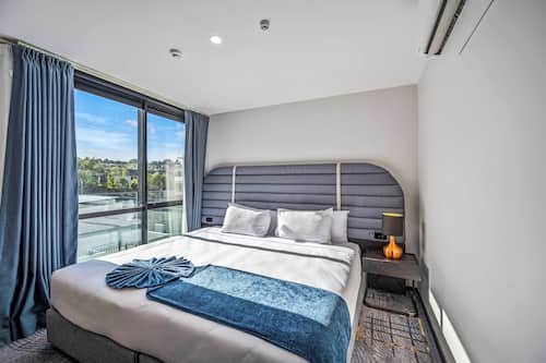Two Bedroom Suite with Two Bathrooms | Premium bedding, pillowtop beds, individually decorated