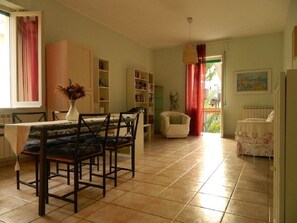 Apartment, 2 Bedrooms | Living area - Bed & Roses (Montesilvano)