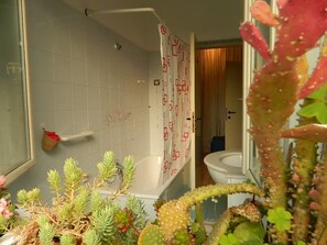 Apartment, 2 Bedrooms | Bathroom | Jetted tub, rainfall showerhead, free toiletries, hair dryer