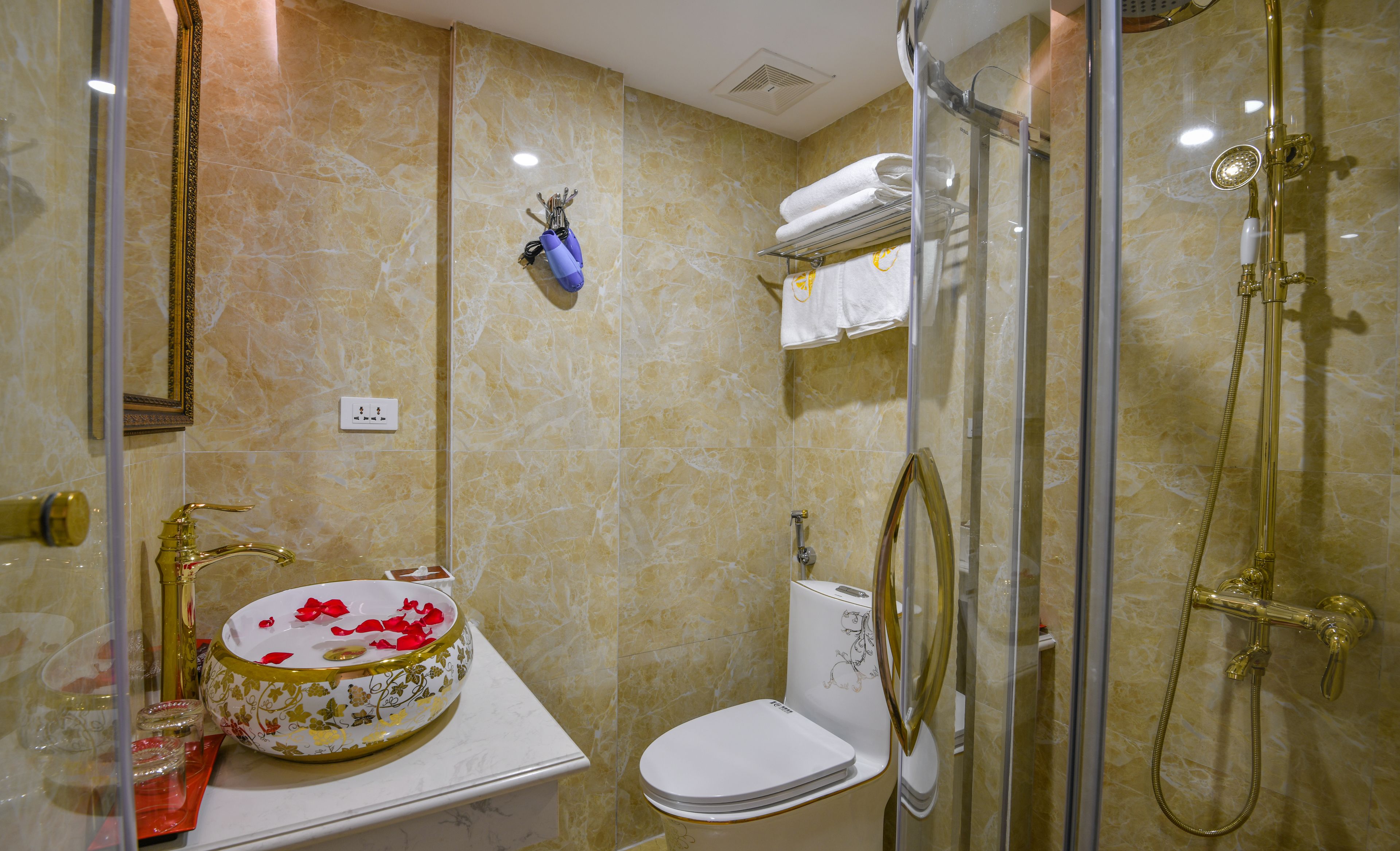 bathroom | shower, free toiletries, hair dryer, dressing gowns