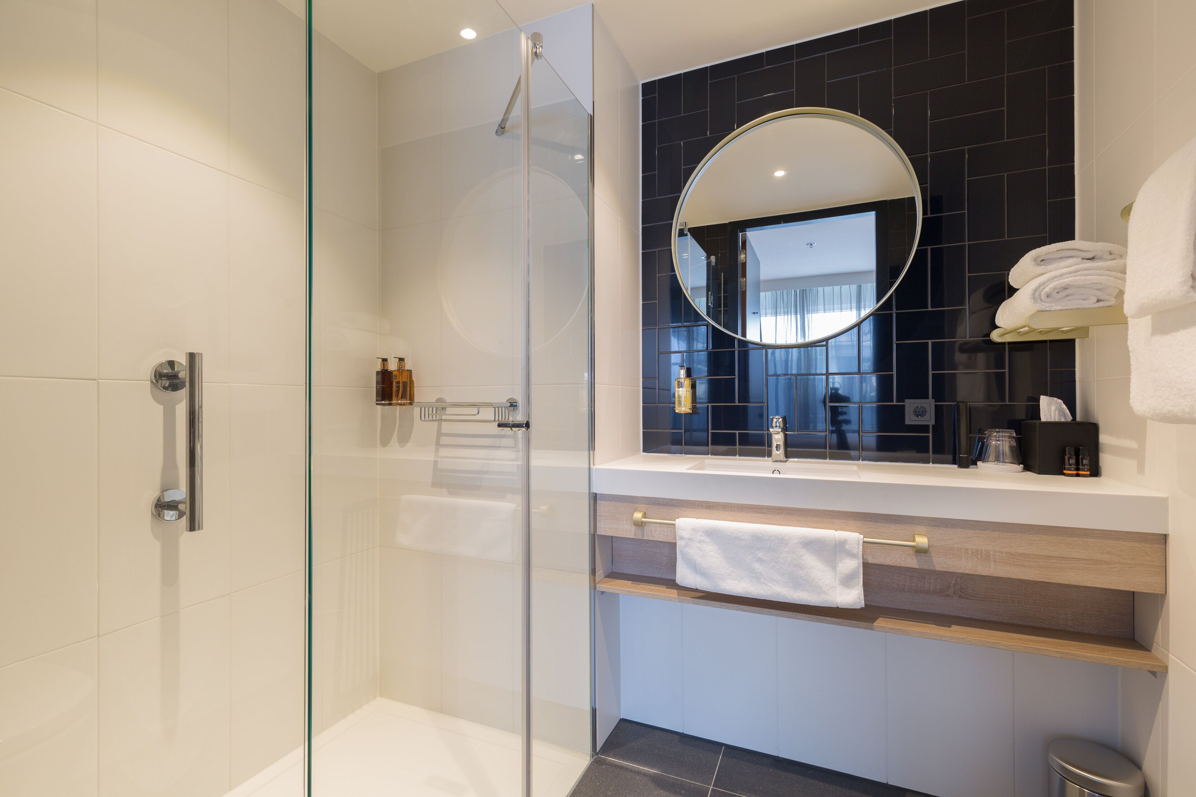 shower, free toiletries, hair dryer, towels