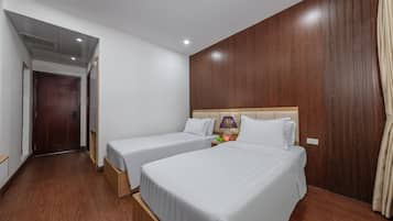 Habitación Deluxe con 2 camas individuales | Ropa de cama de alta calidad, minibar, mobiliario individual