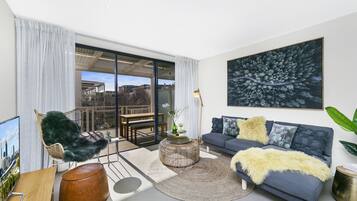 Comfort Apartment, 2 Bedrooms, 2 Bathrooms | Living area | Flat-screen TV