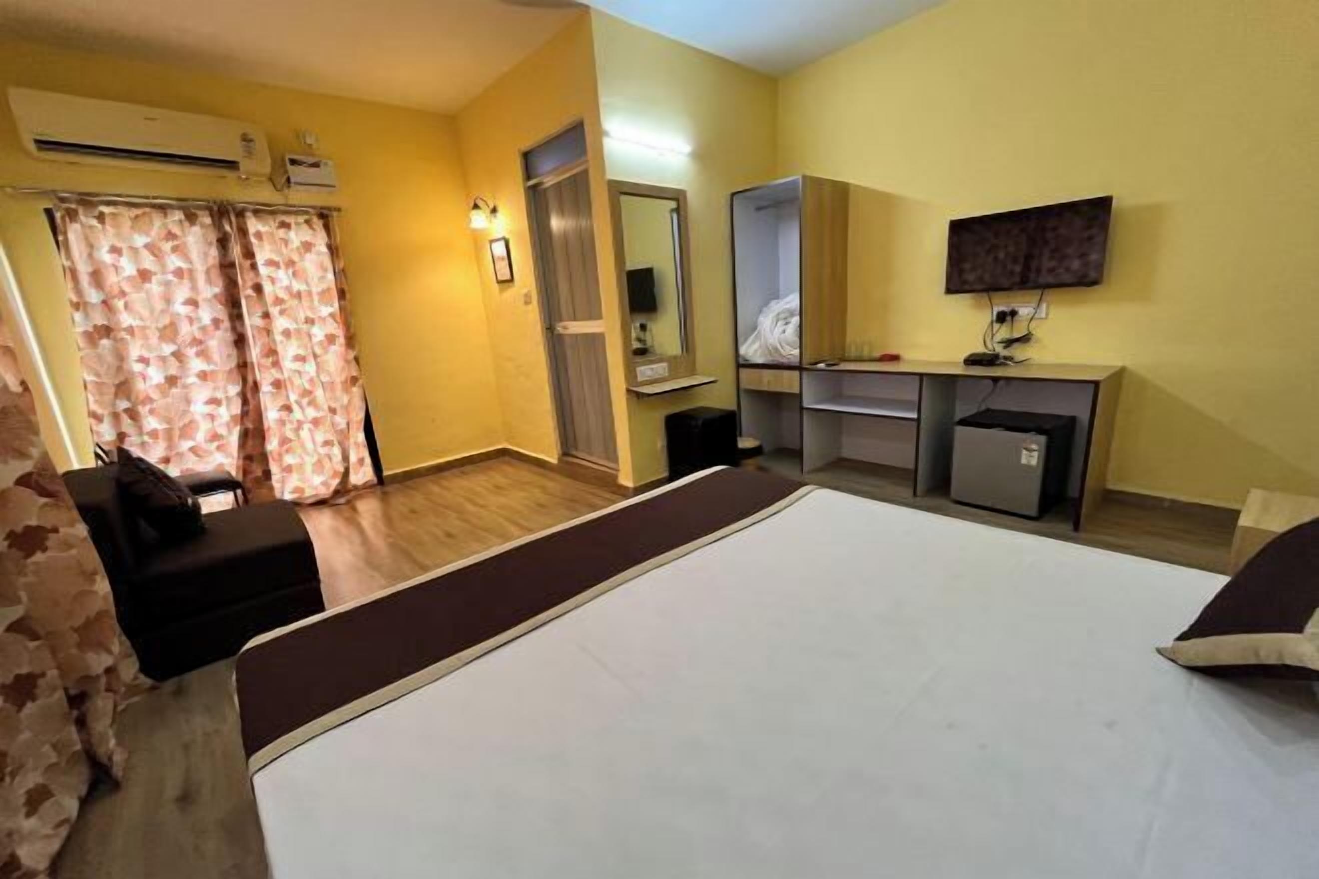 Desk, blackout drapes, iron/ironing board, rollaway beds