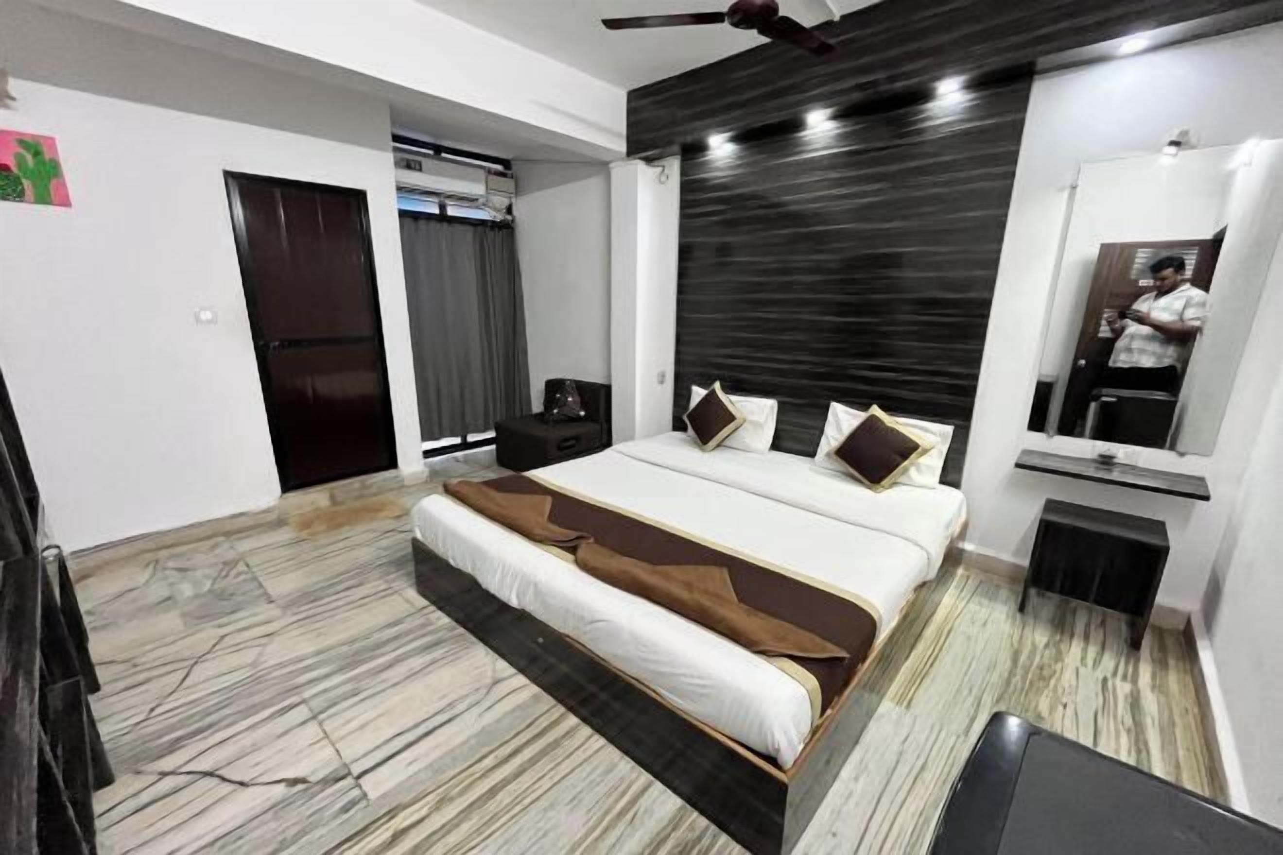 Desk, blackout drapes, iron/ironing board, rollaway beds