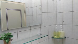 Shower, free toiletries, hair dryer, slippers