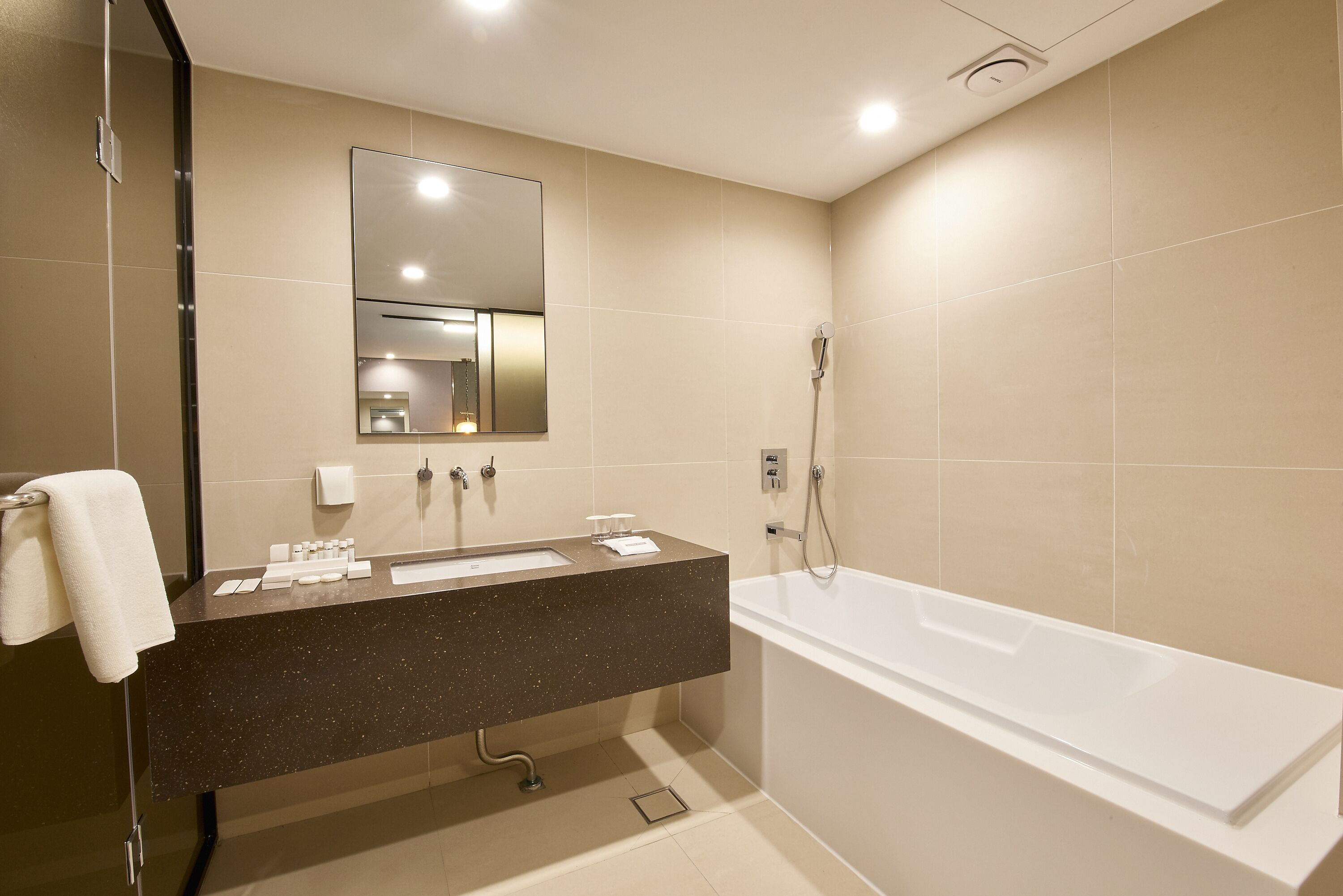 deluxe twin room | bathroom | free toiletries, hair dryer, slippers, bidet