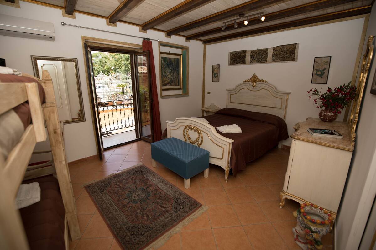 Comfort Quadruple Room | In-room safe, individually decorated, individually furnished, desk