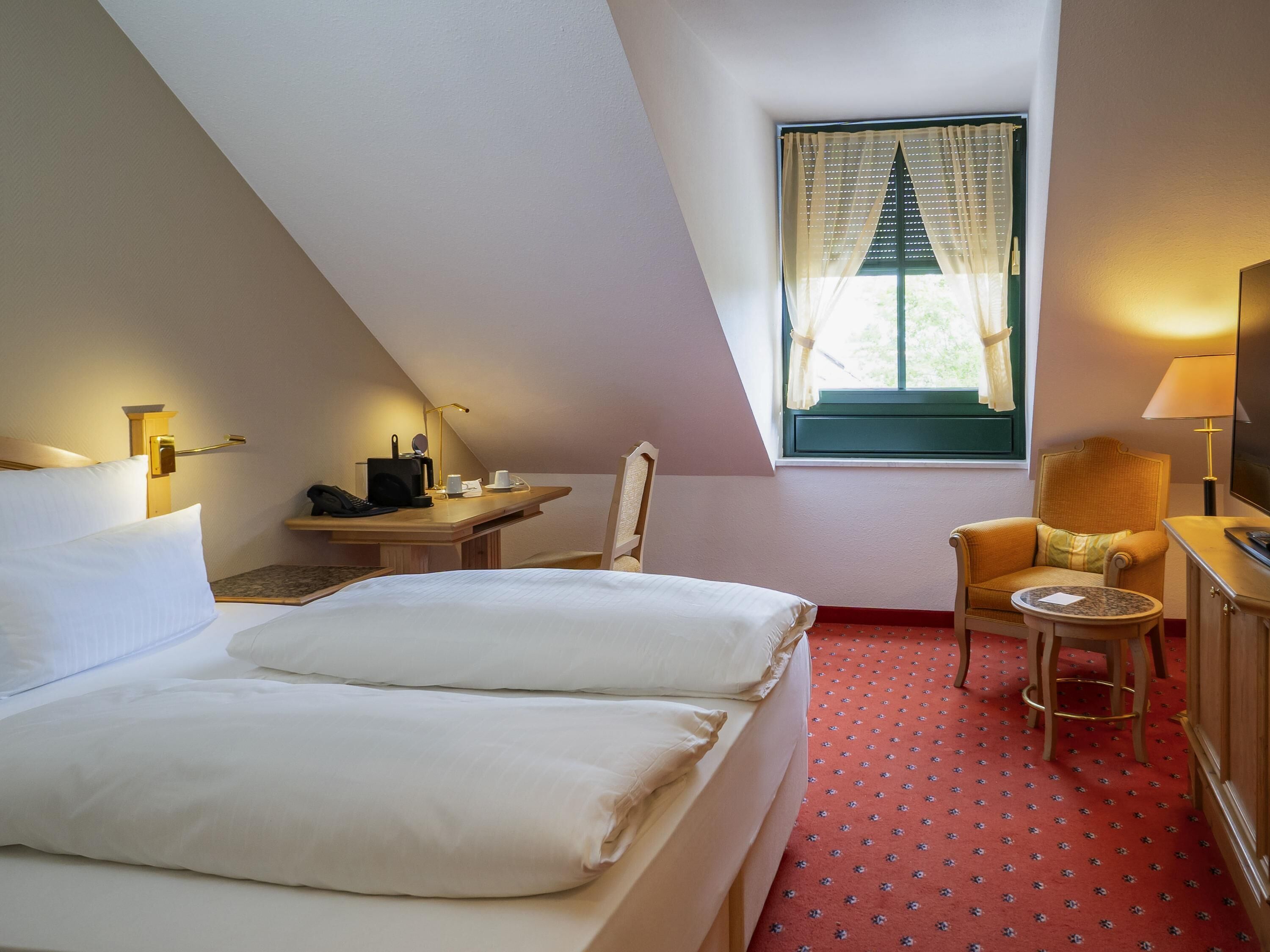Down duvets, minibar, in-room safe, individually decorated