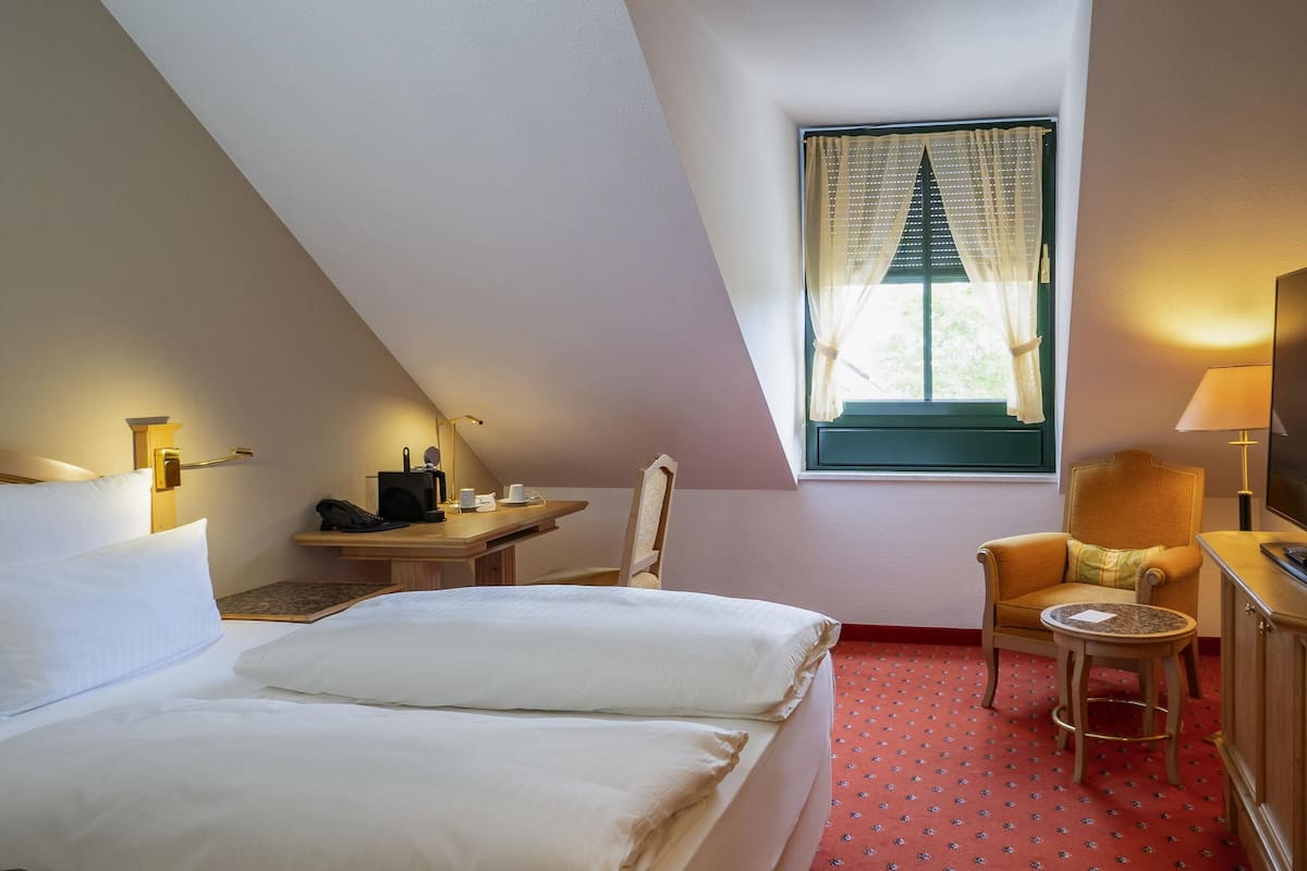 Down duvets, minibar, in-room safe, individually decorated