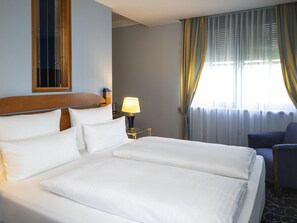 Executive suite, 1 kingsize bed met slaapbank | Donsdekens, een minibar, een kluis op de kamer, individueel gedecoreerd