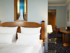 Couette en duvet d'oie, minibar, coffres-forts dans les chambres