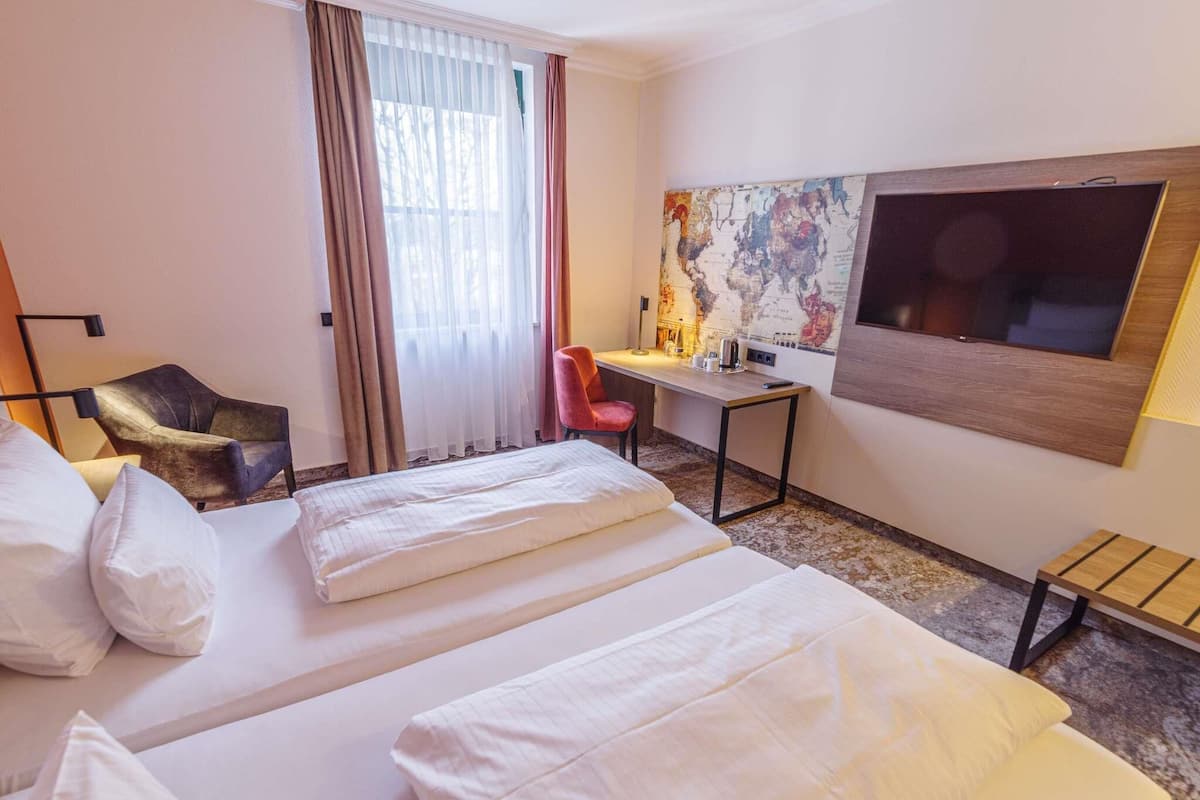Couette en duvet d'oie, minibar, coffres-forts dans les chambres, bureau