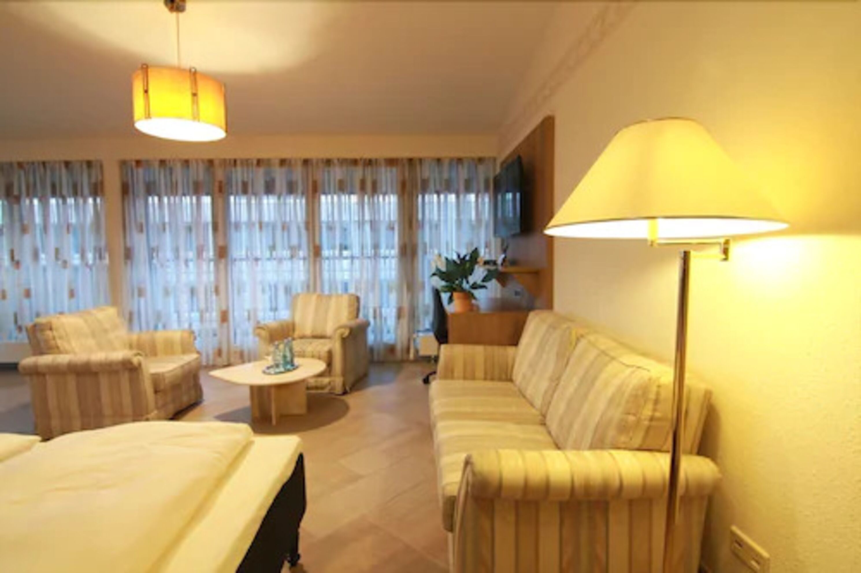 junior suite, non smoking, kitchen | living area | 42-inch flat-screen tv with satellite channels