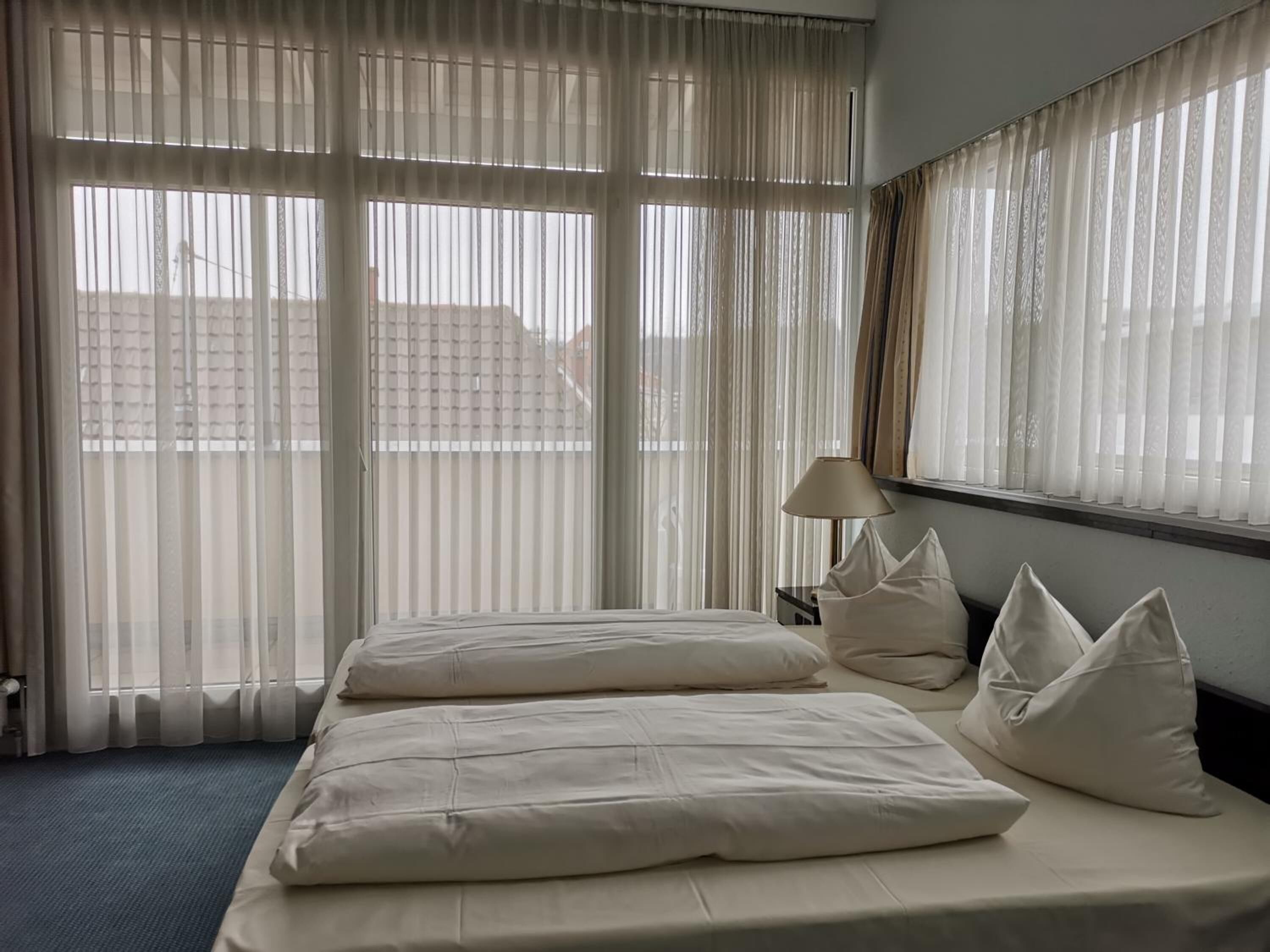 hypo-allergenic bedding, desk, free wifi, bed sheets