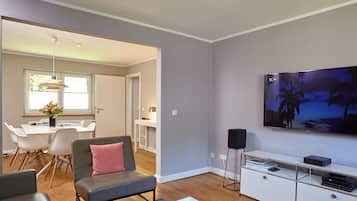 House | Living area | LED TV, video-game console, DVD player