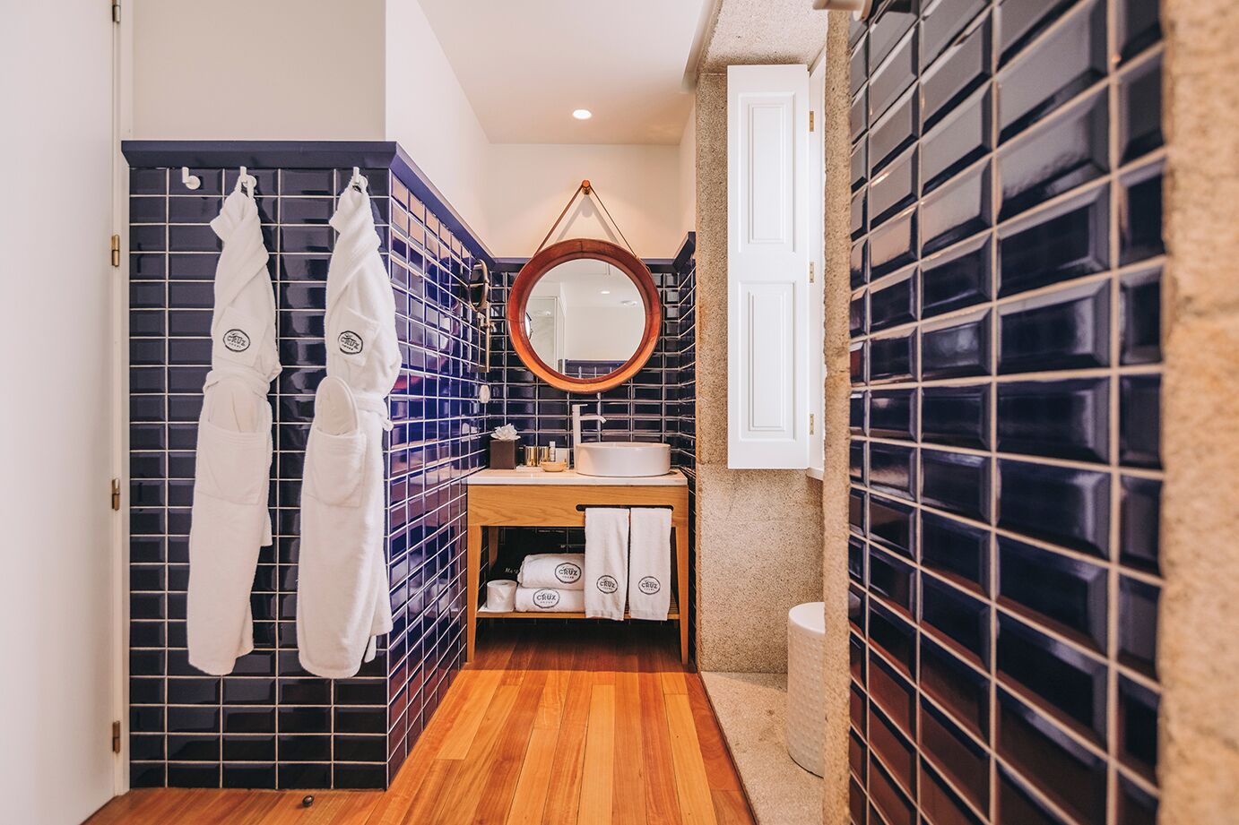 deluxe double room, city view | bathroom | shower, rainfall showerhead, designer toiletries, hair dryer