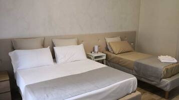 Comfort Triple Room | Memory foam beds, minibar, in-room safe, desk