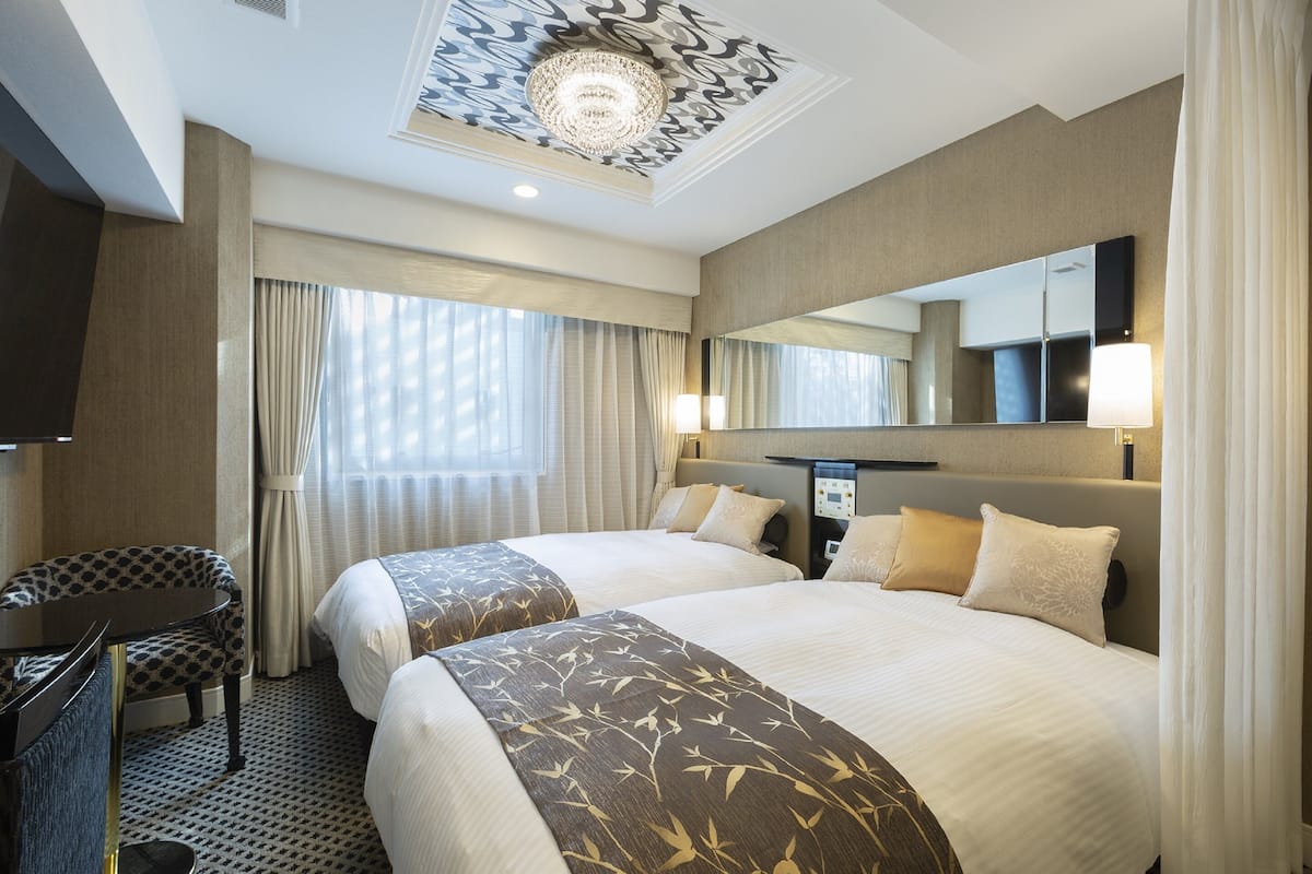 Deluxe-Zweibettzimmer, Nichtraucher (for 2 Guests) | Daunenbettdecken, Verdunkelungsvorhänge, Bügeleisen/Bügelbrett