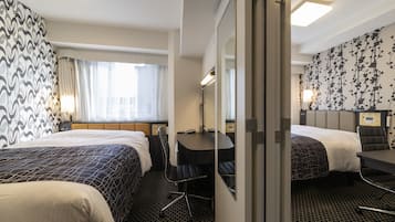 Down comforters, blackout drapes, iron/ironing board, free WiFi