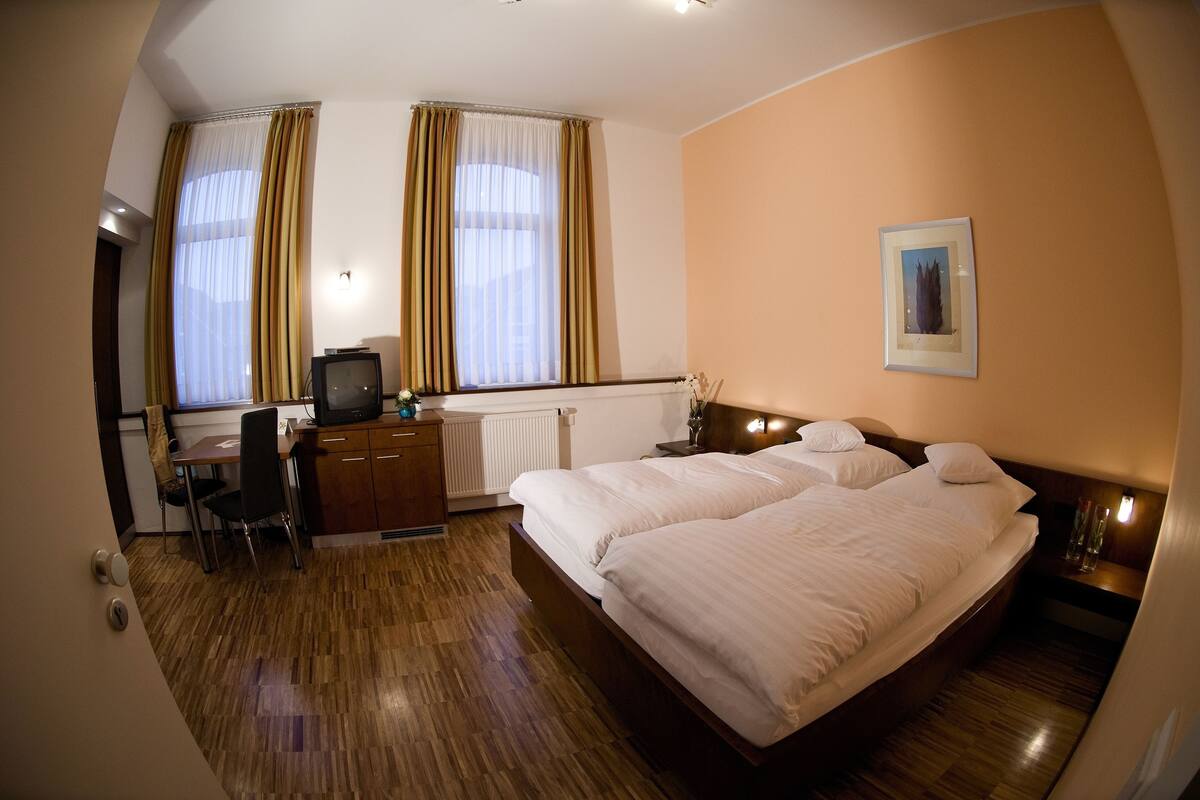 Triple Room | Minibar, desk, blackout curtains, free WiFi