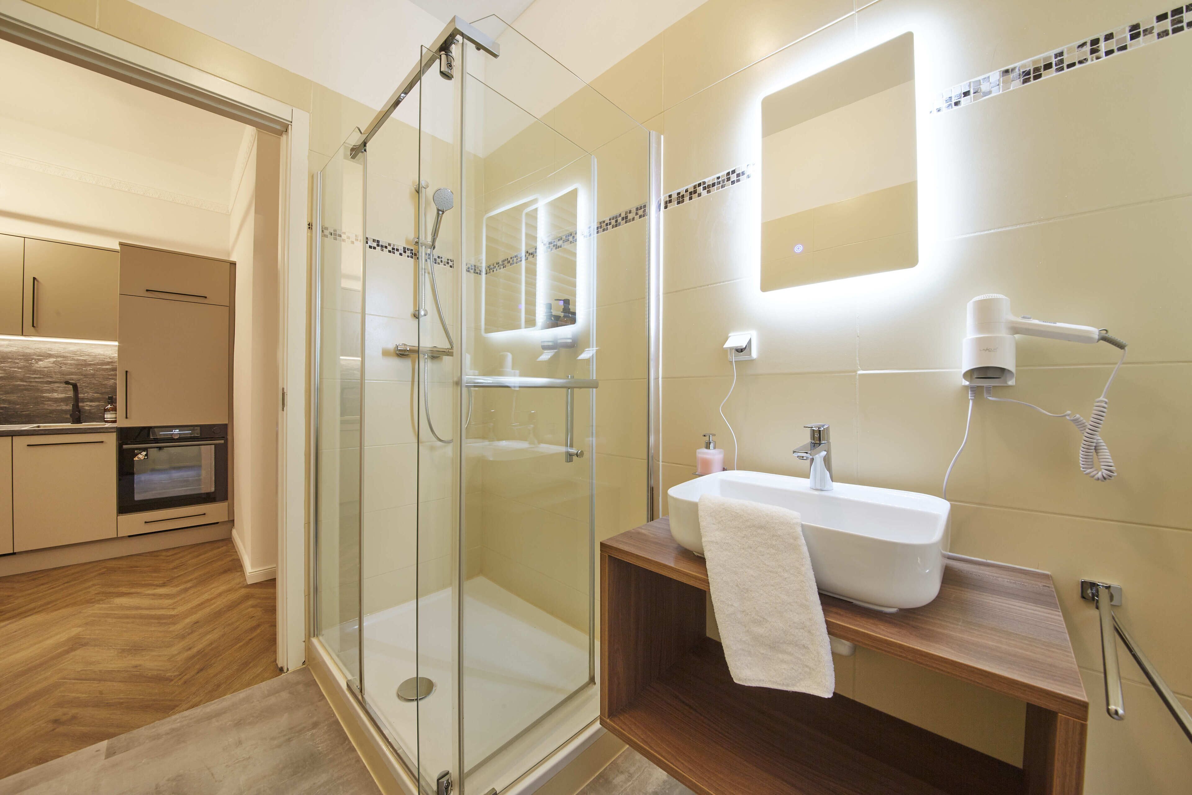 Design Apartment, Non Smoking, Courtyard Area | Bathroom | Hair dryer, towels, toilet paper