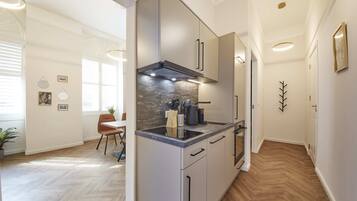 Design Apartment, 1 Bedroom | Private kitchen | Full-size fridge, oven, stovetop, dishwasher