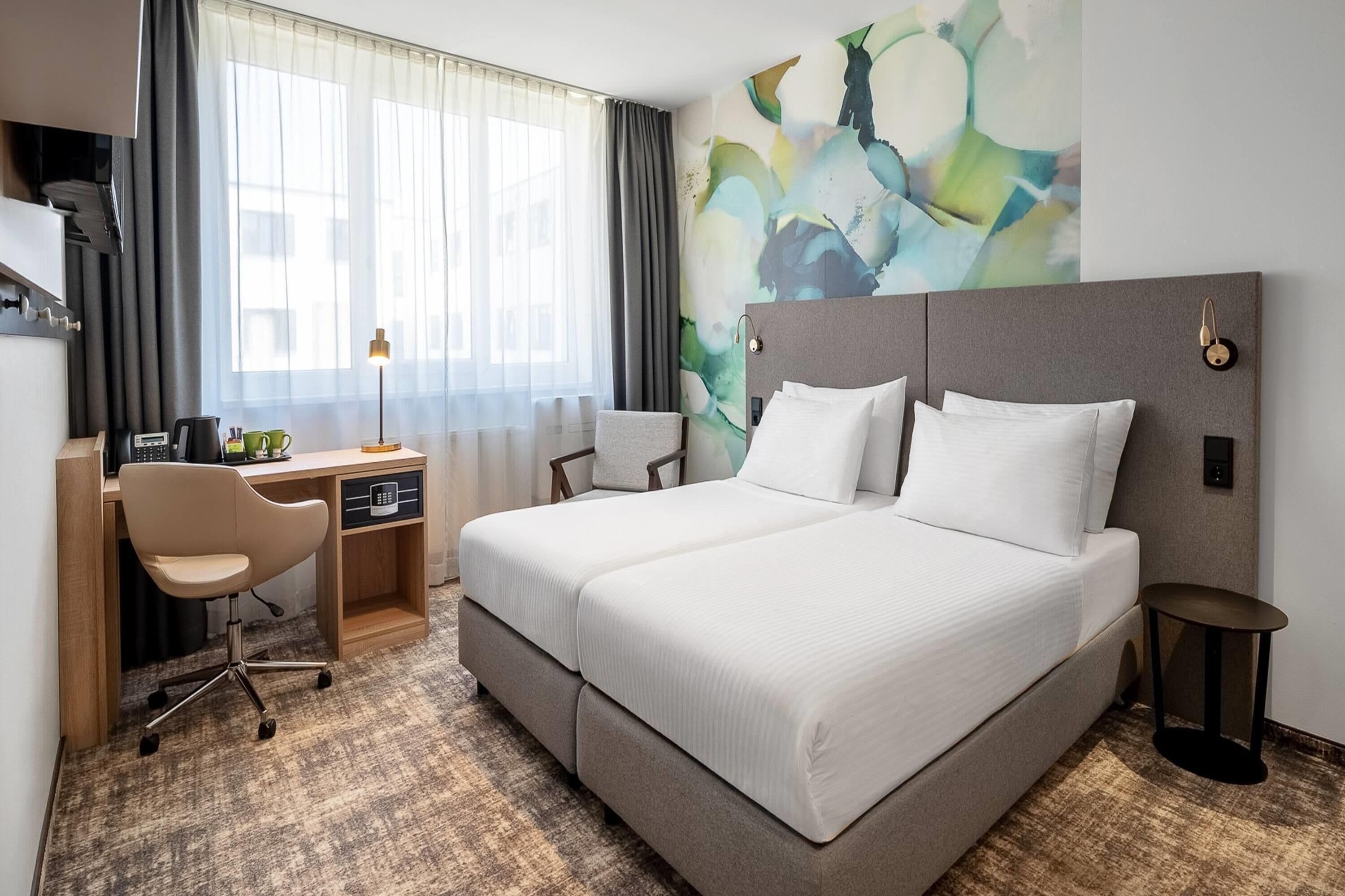 hypo-allergenic bedding, in-room safe, desk, blackout curtains