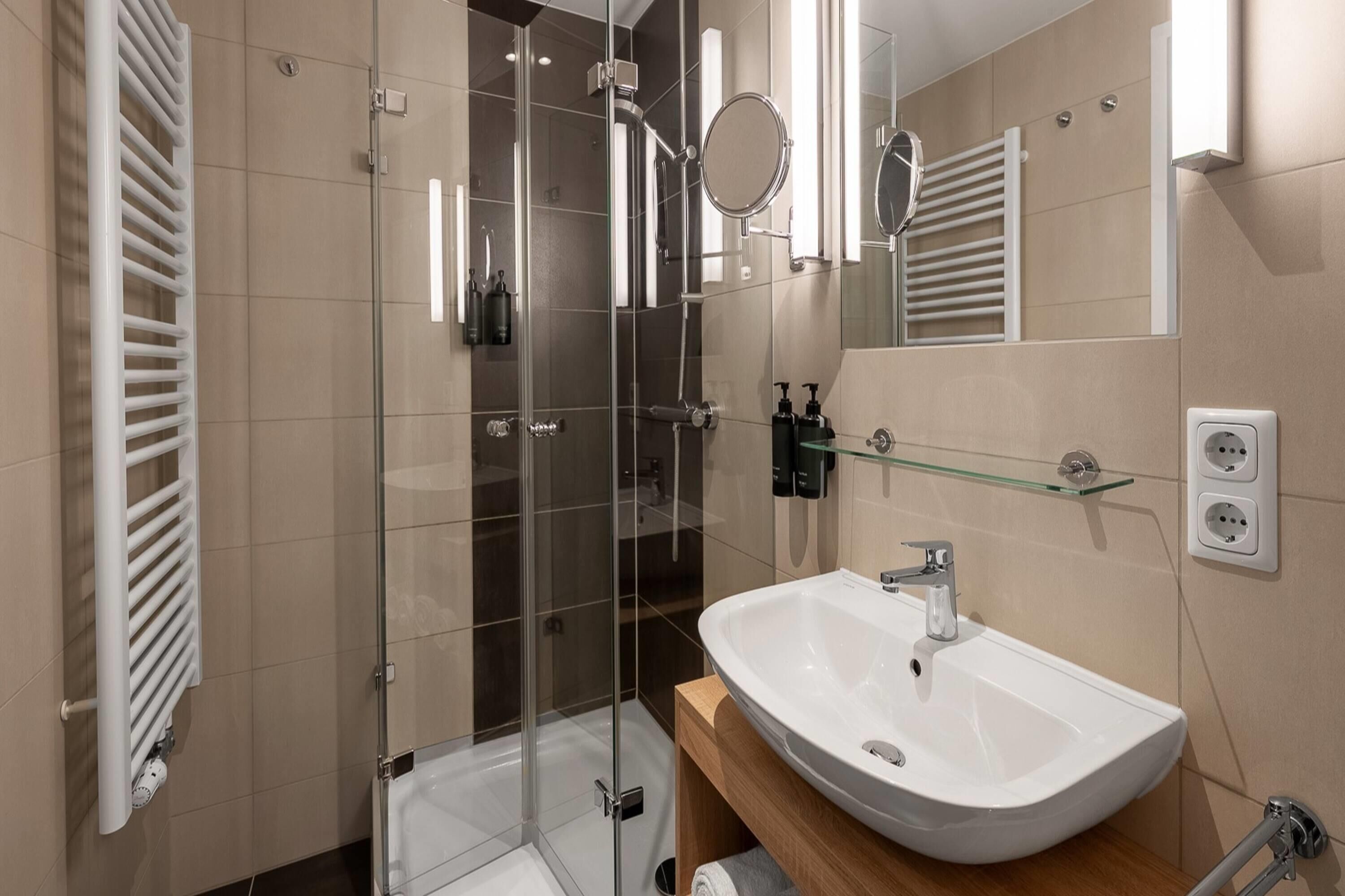 shower, free toiletries, hair dryer, slippers