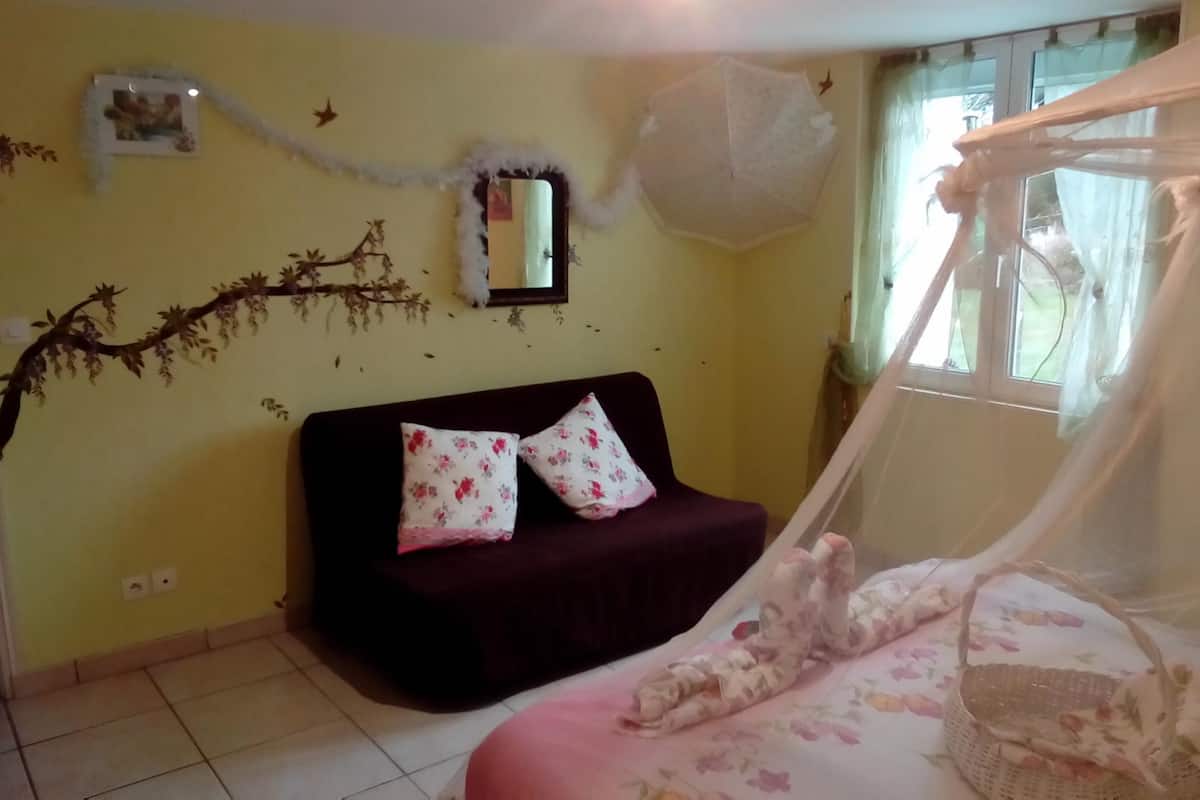 Quadruple Room, Garden View | Individually decorated, individually furnished, desk, blackout drapes
