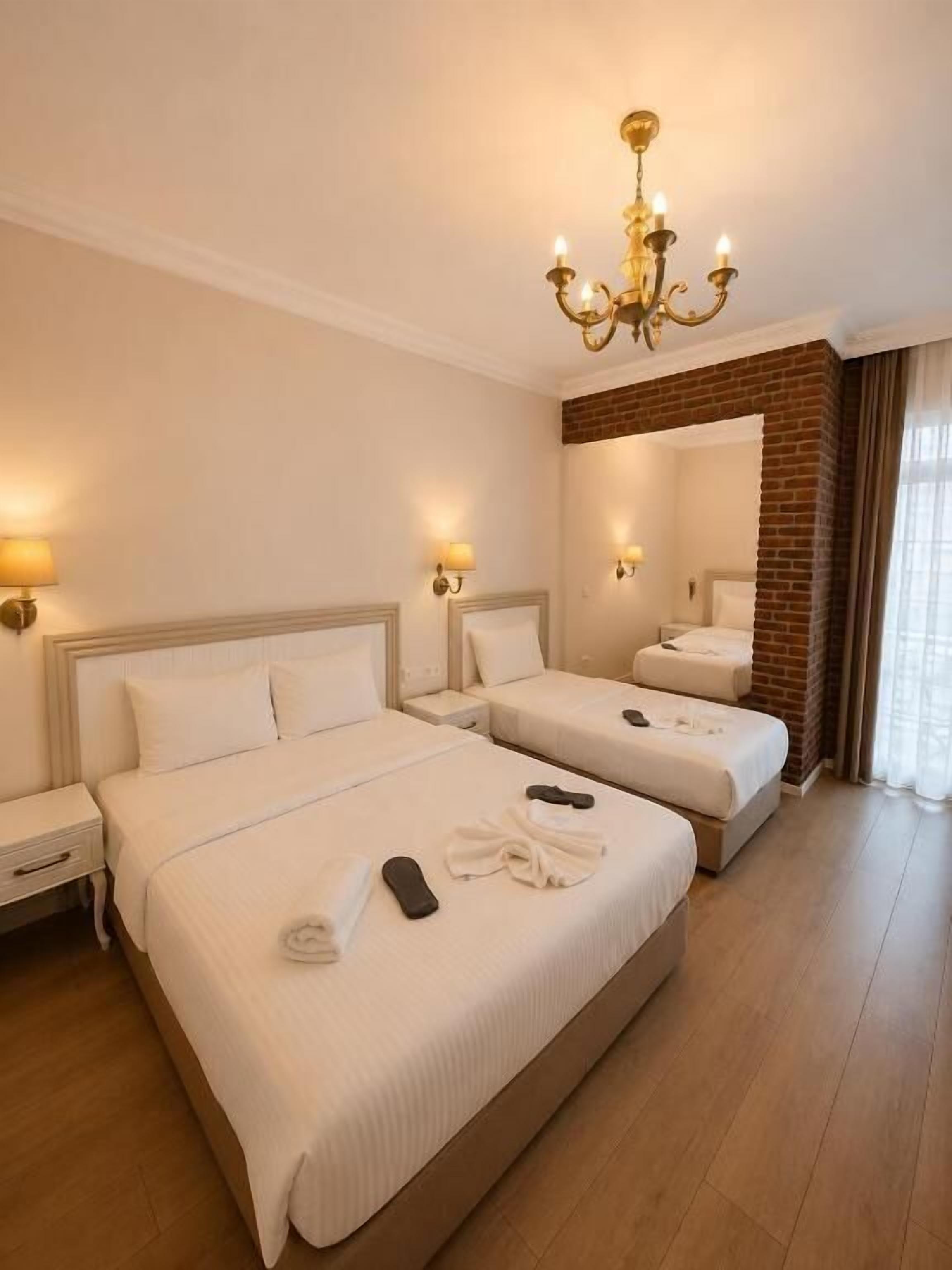 Family Room | Egyptian cotton sheets, premium bedding, in-room safe, desk