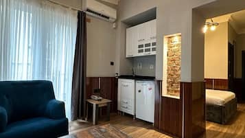 Quarto família | Área de estar | TV 32 polegadas com canais via satélite