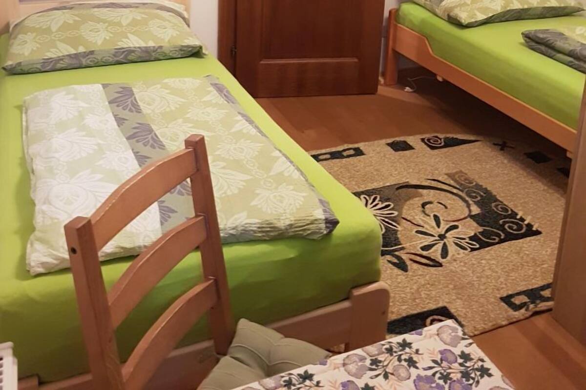 Economy Twin Room, Private Bathroom | Desk, blackout drapes, WiFi (free), individually furnished