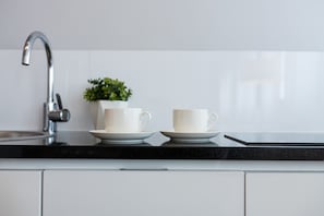 Tabla de planchar con plancha