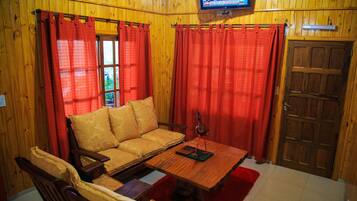 Standard Cabin, 1 Bedroom, Non Smoking, River View | Living area | 32-inch LCD TV with cable channels, TV