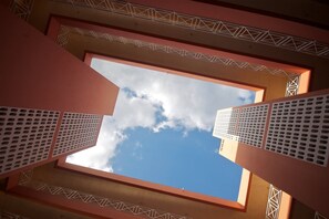 A view through a geometric skylight with a clear sky. - Strathairn 110 by Pro Homes Jamaica (Kingston)