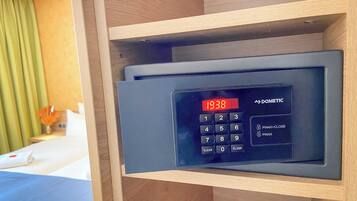 A digital clock on a control panel with the time 19:38.
