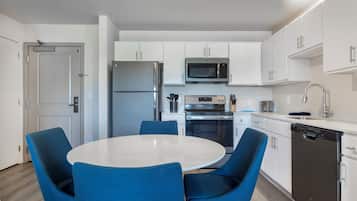 Suite, 1 Bedroom | Private kitchen | Full-sized fridge, microwave, oven, stovetop