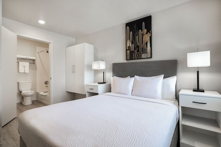 Desk, laptop workspace, soundproofing, iron/ironing board. Soka Suites Dallas - Las Colinas
