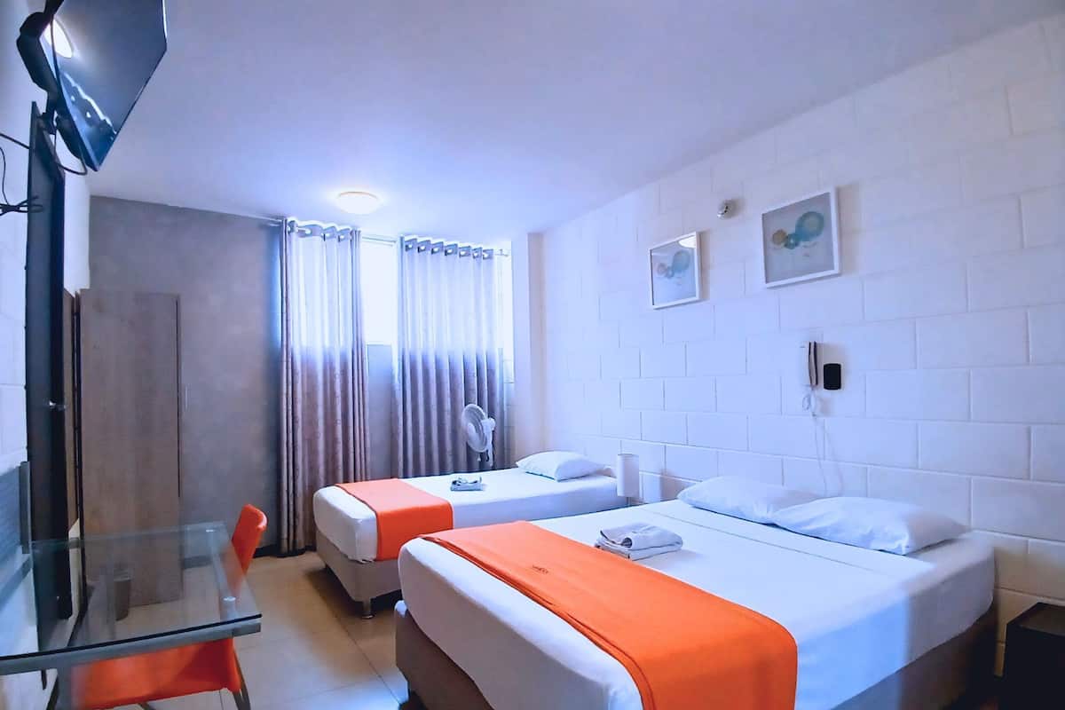 Down duvets, desk, blackout curtains, iron/ironing board