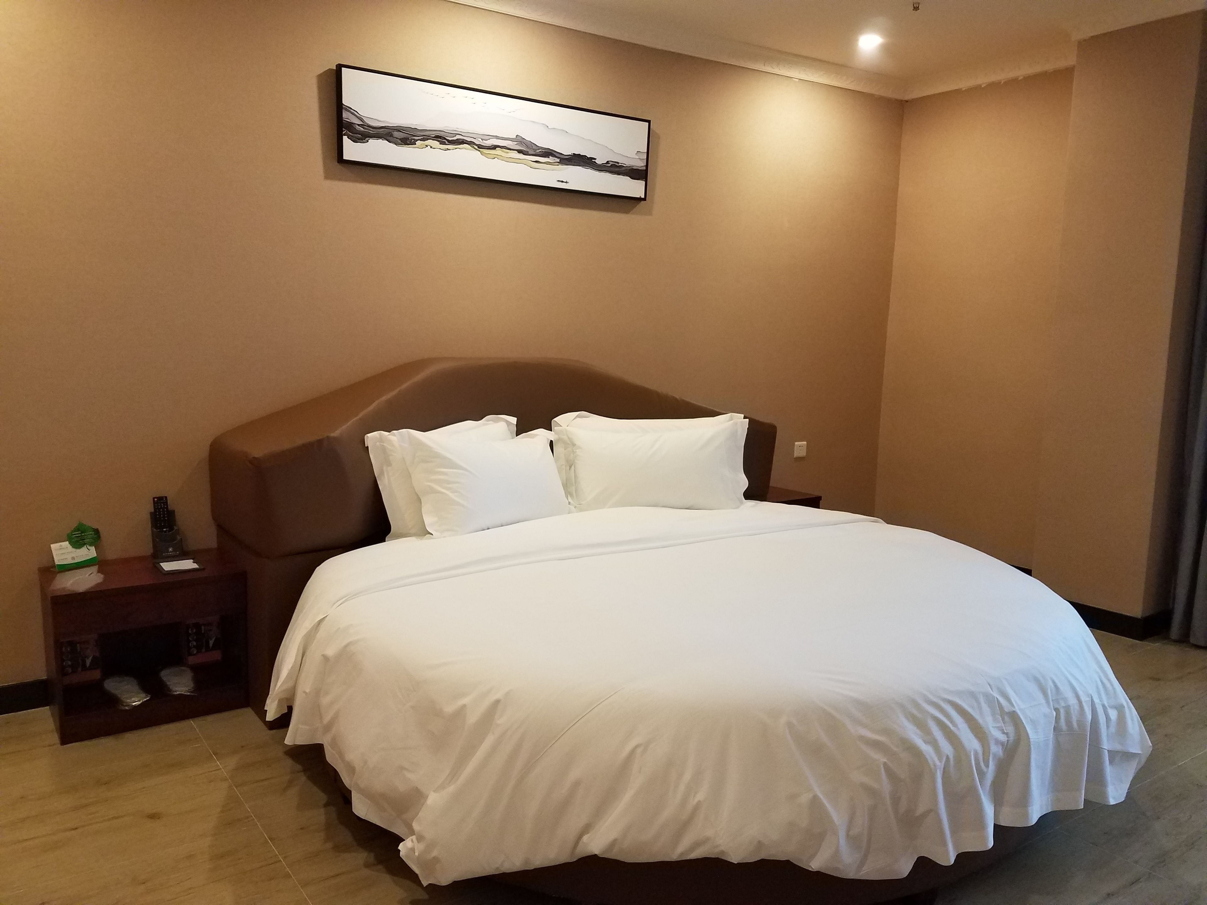 romantic room with round bed | desk, blackout curtains, rollaway beds, free wifi