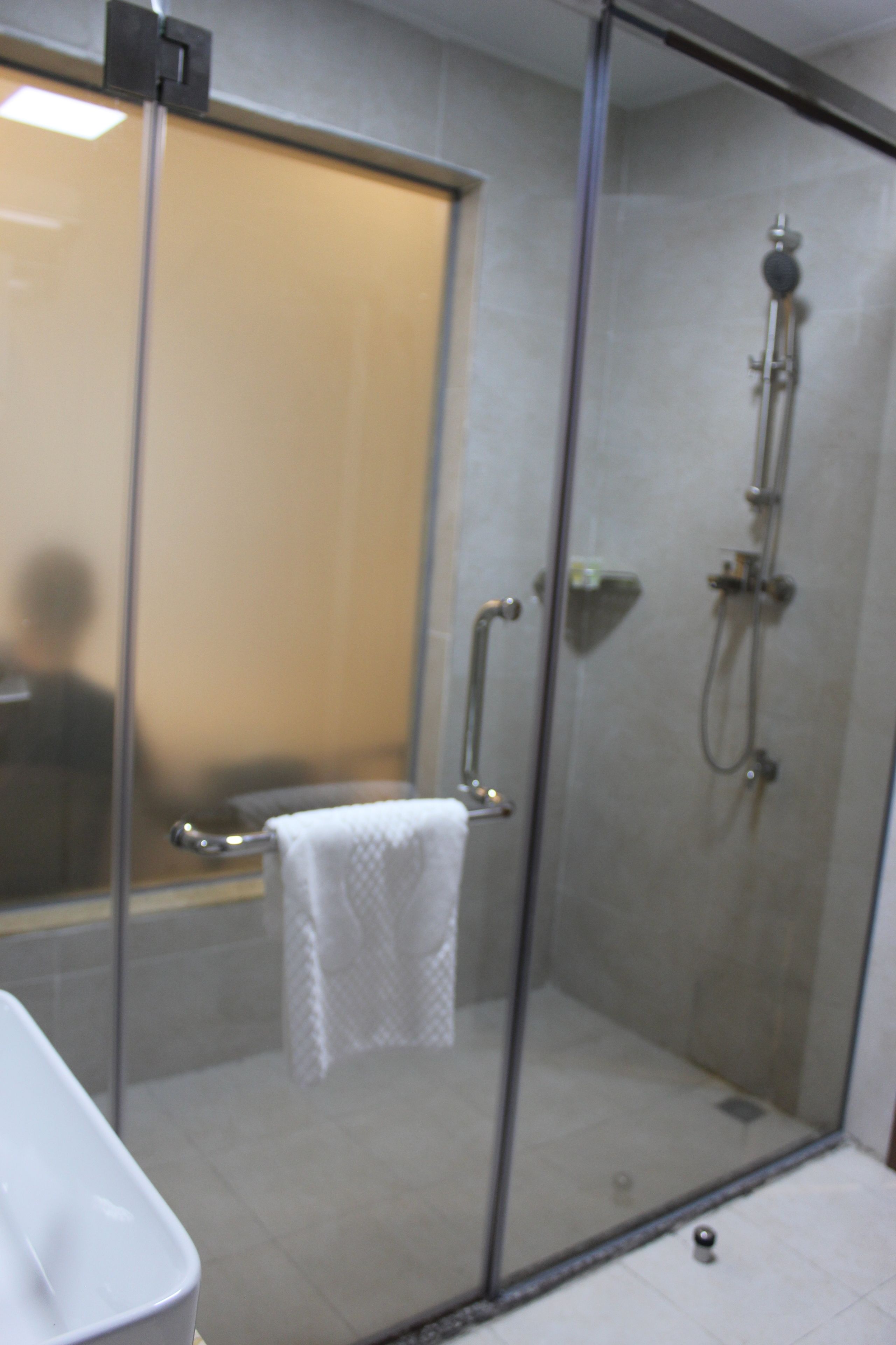 business twin room | bathroom | shower, rainfall showerhead, free toiletries, hair dryer