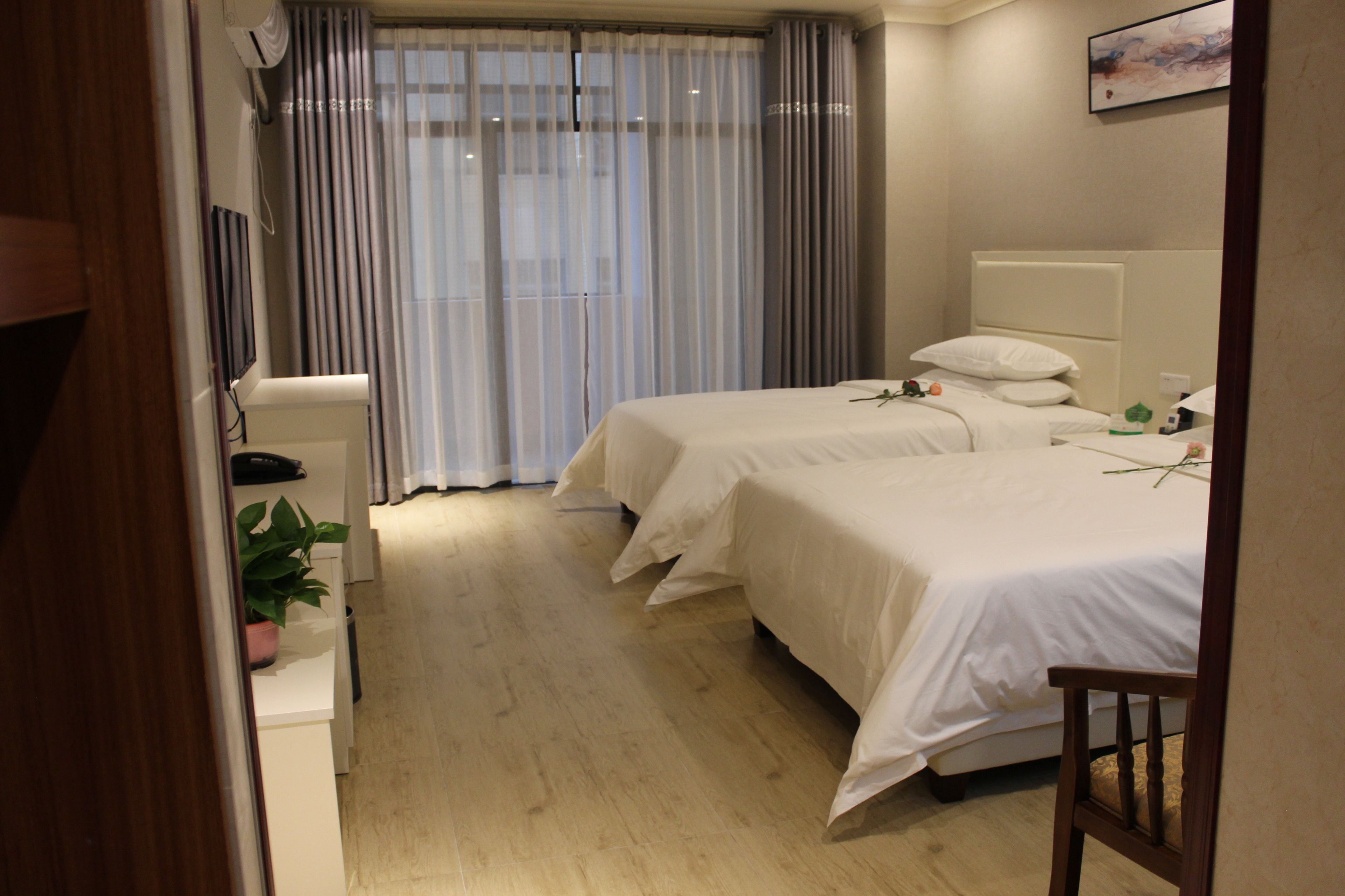 business twin room | desk, blackout curtains, rollaway beds, free wifi